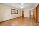 Spacious bedroom with hardwood floors and ceiling fan at 108 Woodhaven Dr, Stockbridge, GA 30281