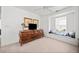 Well-lit bedroom with large dresser and window seat at 151 Nacoochee Way, Canton, GA 30114