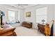 Spacious bedroom featuring a window seat and built-in desk at 151 Nacoochee Way, Canton, GA 30114