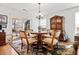 Charming dining room with hardwood floors and a wooden dining table set at 151 Nacoochee Way, Canton, GA 30114