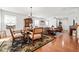 Bright dining area with hardwood floors and a formal dining set at 151 Nacoochee Way, Canton, GA 30114