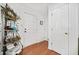 Entryway with hardwood floors, white doors, and an ornate shelf at 151 Nacoochee Way, Canton, GA 30114