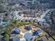 Aerial view of a neighborhood with houses and trees at 201 Augusta Walk, Canton, GA 30114