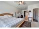 Spacious bedroom with a king-size bed and en-suite bathroom at 201 Augusta Walk, Canton, GA 30114