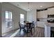 Breakfast nook with a round table and chairs, near kitchen at 201 Augusta Walk, Canton, GA 30114