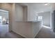 Upstairs hallway with carpet and access to bedrooms at 201 Augusta Walk, Canton, GA 30114