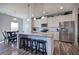 Modern kitchen with stainless steel appliances and granite countertops at 201 Augusta Walk, Canton, GA 30114