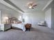 Relaxing main bedroom with a comfortable seating area and large windows at 201 Augusta Walk, Canton, GA 30114