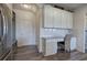 Built-in home office with granite countertop and white cabinets at 201 Augusta Walk, Canton, GA 30114