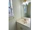 Small bathroom with a white vanity and gold fixtures at 4299 High Country Dr, Douglasville, GA 30135