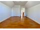 Large bedroom with hardwood floors and sloped ceilings at 4299 High Country Dr, Douglasville, GA 30135