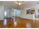 Open living room with hardwood floors and kitchen view at 4299 High Country Dr, Douglasville, GA 30135