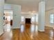 Open living room with hardwood floors, kitchen and fireplace views at 4299 High Country Dr, Douglasville, GA 30135