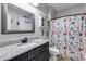 Bathroom with granite countertop and nautical-themed decor at 701 Jones Mill Rd, Whitesburg, GA 30185