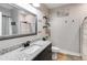 Bathroom with granite countertop and gray cabinets at 701 Jones Mill Rd, Whitesburg, GA 30185