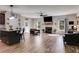 Spacious living area with fireplace and kitchen view at 701 Jones Mill Rd, Whitesburg, GA 30185