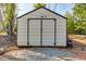 Large storage shed with double doors and neutral color at 701 Jones Mill Rd, Whitesburg, GA 30185