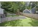 Large backyard with tiered retaining wall and steps at 1010 Edgewater Dr, Atlanta, GA 30328