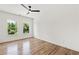 Bright bedroom with hardwood floors and ceiling fan at 1010 Edgewater Dr, Atlanta, GA 30328