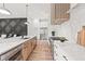 Modern kitchen with wood and white cabinetry at 1010 Edgewater Dr, Atlanta, GA 30328