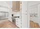 Modern kitchen featuring stainless steel appliances and white cabinetry at 1010 Edgewater Dr, Atlanta, GA 30328