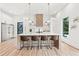 Modern kitchen with white cabinets and large island at 1010 Edgewater Dr, Atlanta, GA 30328