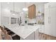 Modern kitchen with white cabinets, quartz counters at 1010 Edgewater Dr, Atlanta, GA 30328