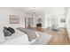 Luxurious main bedroom with sitting area and hardwood floors at 1010 Edgewater Dr, Atlanta, GA 30328