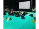 Community pool with movie night and float toys at 1010 Edgewater Dr, Atlanta, GA 30328