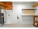 Unfinished basement area with shelving and ample storage at 114 Woodhaven Dr, Stockbridge, GA 30281