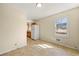 Bright dining area with tile floors and kitchen access at 114 Woodhaven Dr, Stockbridge, GA 30281