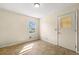 Simple dining area with tile floors and large window at 114 Woodhaven Dr, Stockbridge, GA 30281