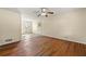 Spacious living room with hardwood floors and ceiling fan at 114 Woodhaven Dr, Stockbridge, GA 30281