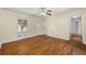 Hardwood floor living room with access to hallway and kitchen at 114 Woodhaven Dr, Stockbridge, GA 30281