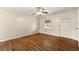 Bright living room featuring hardwood floors and ceiling fan at 114 Woodhaven Dr, Stockbridge, GA 30281