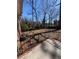 Cozy patio with iron railing offers a serene outdoor space to relax and entertain guests at 1971 Annette Ln, Austell, GA 30106