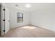 Bedroom with new flooring, natural light, and closet at 3364 Sheree Trl, Stone Mountain, GA 30087