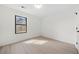 Bright bedroom featuring a large window and modern, light-colored flooring at 3364 Sheree Trl, Stone Mountain, GA 30087