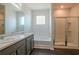 Bathroom with double vanity, soaking tub, and shower at 3732 Stonebranch Ln, Loganville, GA 30052