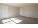 Bright bedroom featuring plush carpeting and ample natural light at 3732 Stonebranch Ln, Loganville, GA 30052