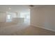Spacious loft area with neutral carpeting and multiple windows at 3732 Stonebranch Ln, Loganville, GA 30052