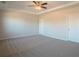 Large main bedroom with ceiling fan and carpeted floors at 3732 Stonebranch Ln, Loganville, GA 30052