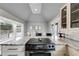 Bright kitchen featuring granite countertops, stainless steel appliances, and a skylight at 570 Flat Shoals Se Ave, Atlanta, GA 30316