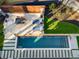 Aerial view of a luxurious pool and patio area at 1974 Ellwyn Dr, Brookhaven, GA 30341