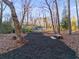 Landscaped pathway leading through a wooded area at 1974 Ellwyn Dr, Brookhaven, GA 30341