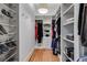 Large walk-in closet with ample shelving and hanging space at 1974 Ellwyn Dr, Brookhaven, GA 30341