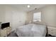 Charming bedroom with a double door closet and soft gray bedding at 2013 Parador Bnd, Mcdonough, GA 30253