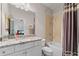 Functional bathroom with a shower-tub combo, granite vanity, and neutral color scheme at 2109 Rocky Falls Nw Ct, Kennesaw, GA 30152