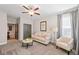 Bedroom featuring neutral paint, carpet flooring, and a ceiling fan at 2109 Rocky Falls Nw Ct, Kennesaw, GA 30152