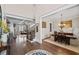 Bright entryway with hardwood floors transitioning to the living and dining areas at 2109 Rocky Falls Nw Ct, Kennesaw, GA 30152